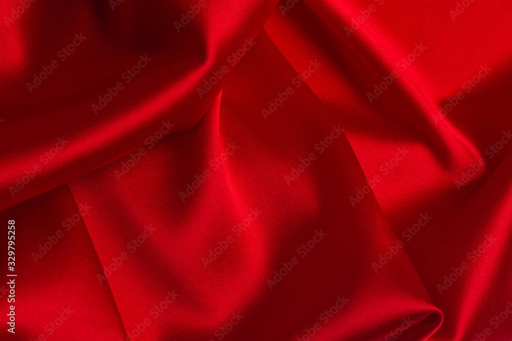 Red silk or satin luxury fabric texture can use as abstract background. Red silk or satin luxury fabric texture can use as abstract background.