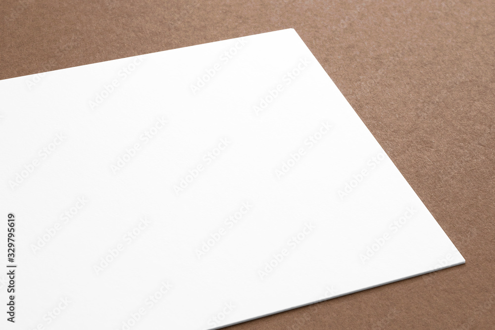 Blank paper card on carton background. Close view 3d render. Blank paper card on carton background. Close view 3d render.