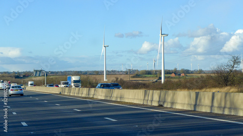 Windmill beside the motorway in England UK