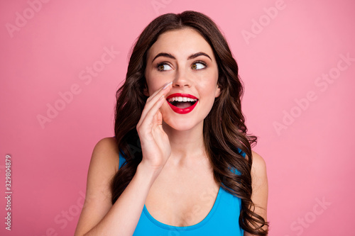 Closeup photo of pretty funky wavy lady open mouth arm near mouth say tell speak secret information people crowd wear casual blue singlet isolated pink bright color background