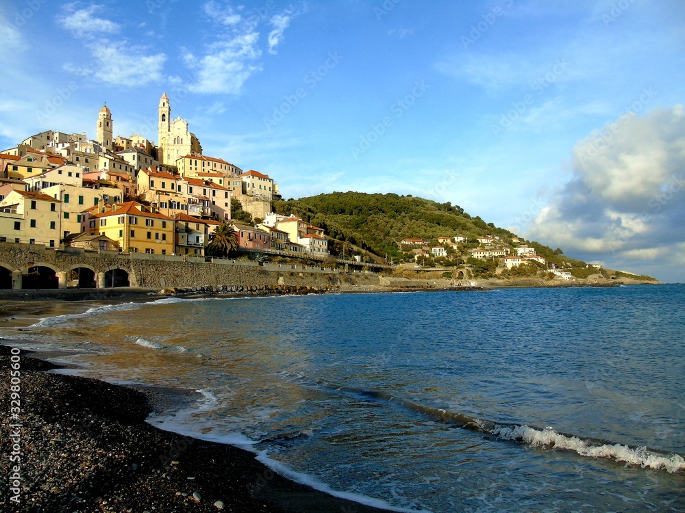 Cervo Ligure, Italy - 02/15/2020: Travelling around the Riviera Ligure in winter days. Beautiful photography of the small vilagges near the sea with typical old buildings.