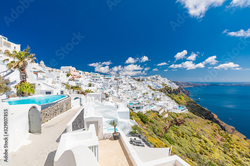 Luxury summer travel and vacation landscape. White architecture on Santorini island  Greece. Swimming pool in luxury hotel. Beautiful view on the sea