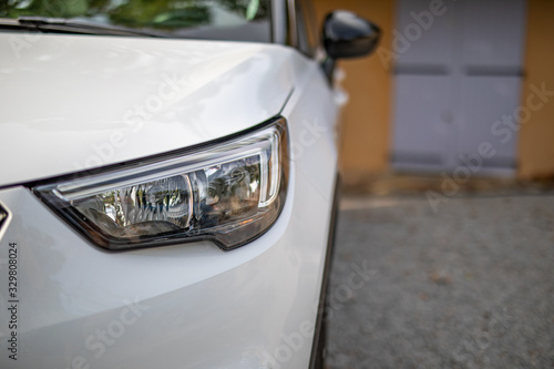 Modern and luxury car headlights. Exterior detail.