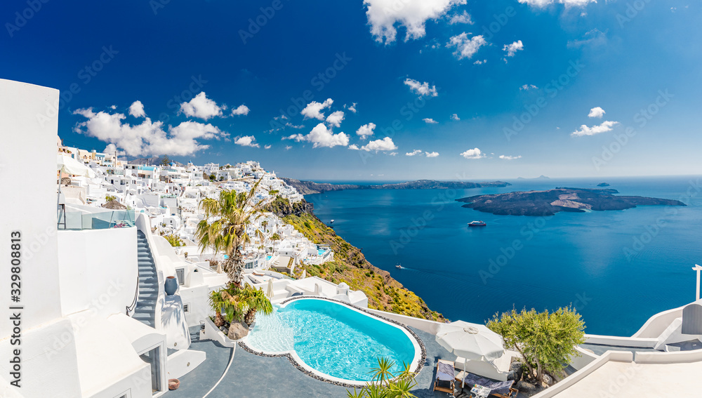 Obraz premium Summer vacation landscape over blue bay seascape. White architecture on Santorini island, Greece. Swimming pool in luxury hotel. Beautiful view on the sea