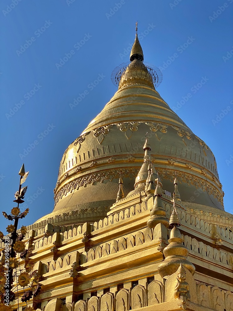 The top of the Shwezigon Pagoda with clear blue sky in the afteroon  in Bagan, World Heritage Site, Myanmar