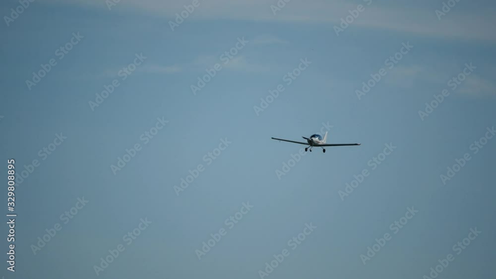 Ultralight small private aircraft airplane flying in the sky over the airfield. Aviation festival holiday at the aerodrome Ultralight small private aircraft airplane flying in the sky over the airfield. Aviation festival holiday at the aerodrome
