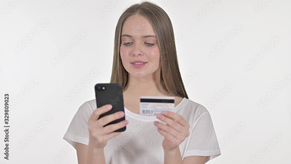 Online Payment on Smartphone by young Woman, White Background Online Payment on Smartphone by young Woman, White Background