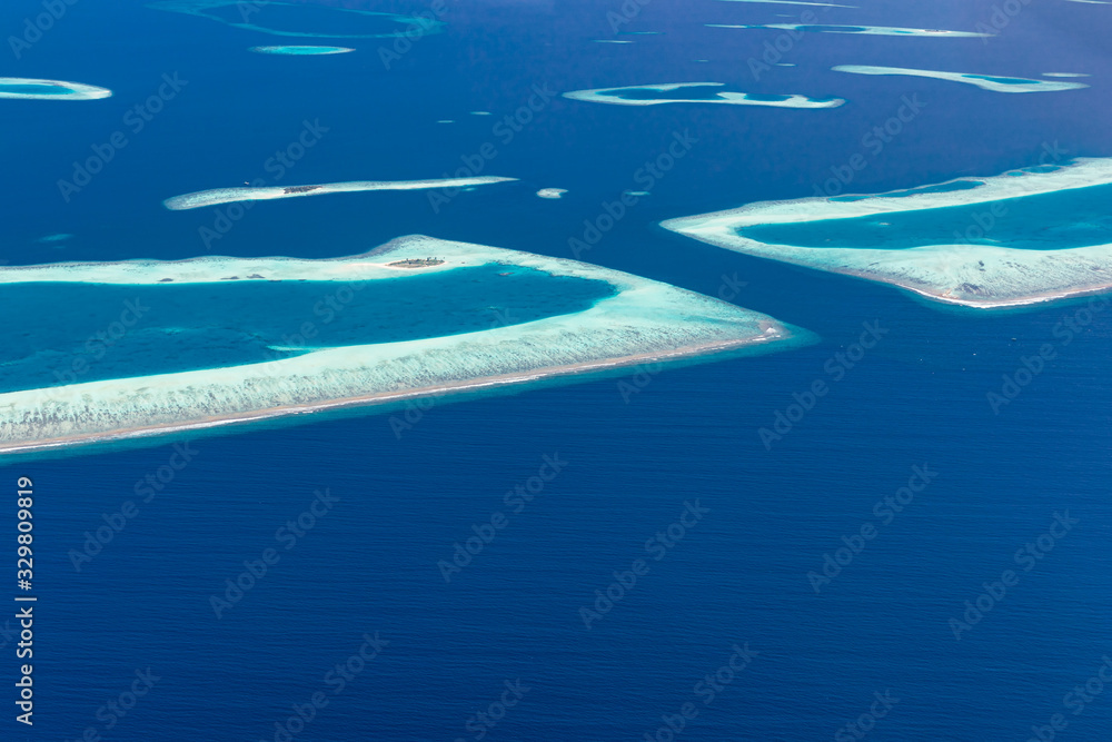 Aerial view of Maldives atolls is the world top beauty. Maldives tourism, luxury travel destination landscape, seascape