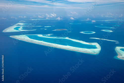 Aerial view of Maldives atolls is the world top beauty. Maldives tourism, luxury travel destination landscape, seascape