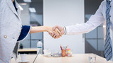 Business people shake hands to finish the meeting , Hand in hand to work together