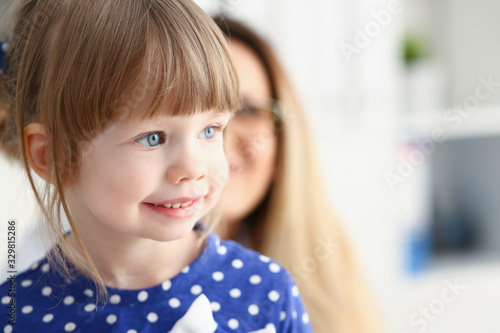 Little child with mother at pediatrician reception. Physical exam cute infant portrait baby aid healthy lifestyle ward round child sickness clinic test high quality and baby concept