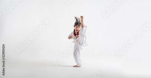 Fototapeta Naklejka Na Ścianę i Meble -  The studio asian kids  karate martial arts
