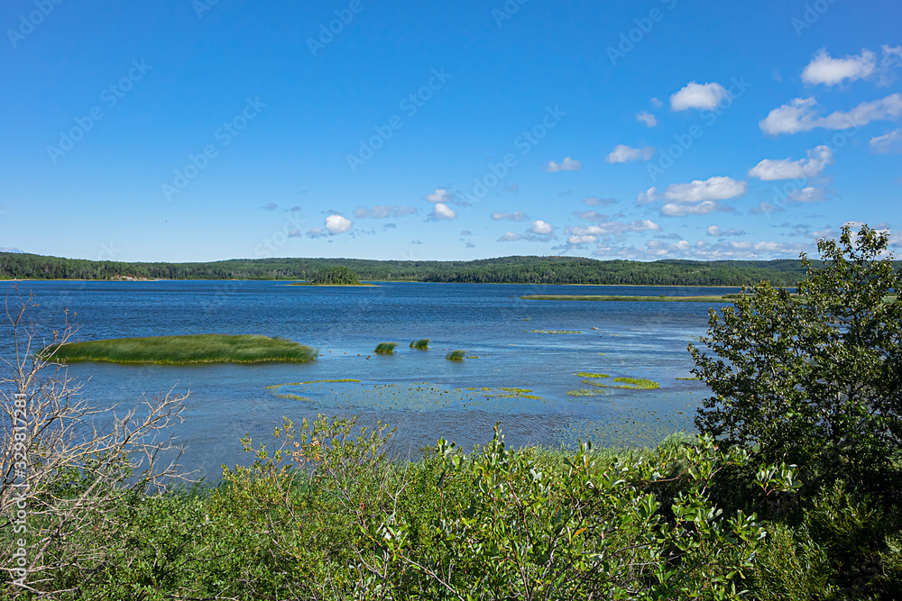 Picturesque view of Lake Matapedia (Lac Matapedia) shore near the city of Amqui in Quebec, Canada.