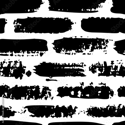 Grunge brush stroke seamless pattern. Abstract texture hand drawn with a ink. Vector Monochrome Scandinavian background