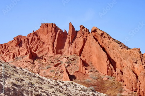 red cliffs in the canyon fairy tale, lake issycula, Kyrgyzia