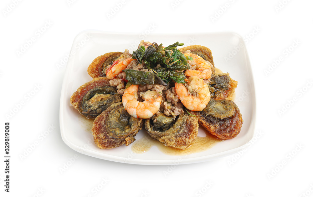 Closeup Stir-fried basil leave with minced pork and fried preserved egg isolated on white background with clipping path, Dishes Thailand, Thai Food. Closeup Stir-fried basil leave with minced pork and fried preserved egg isolated on white background with clipping path, Dishes Thailand, Thai Food.