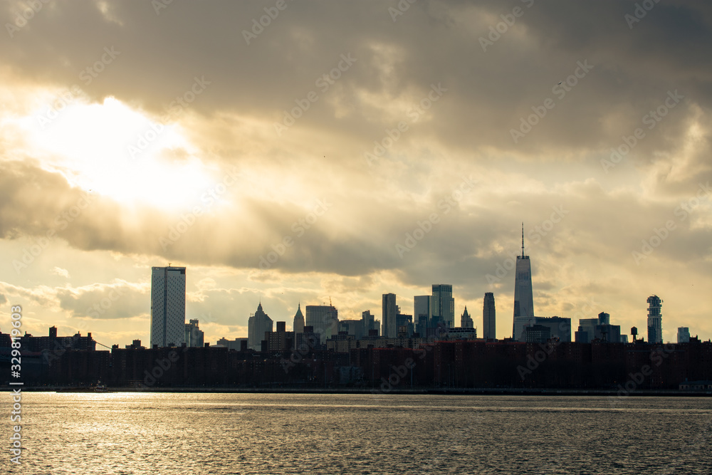 Lower Manhattan Skyline on the East River in New York City during Sunset