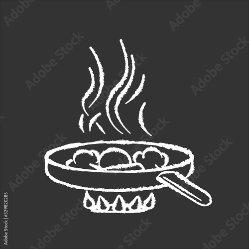 Frying chalk white icon on black background. Fast food preparation, meal preparation in oil. Culinary technique. Cooking pan with ingredients on oven fire isolated vector chalkboard illustration