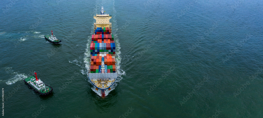 Foto de Aerial view container ship carrying container box in import ...