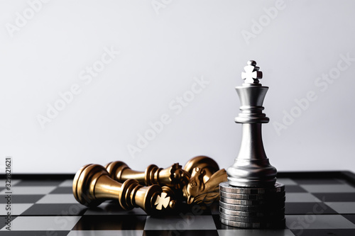 A chess king last stand as a true winner.Money game concept. Copy space.