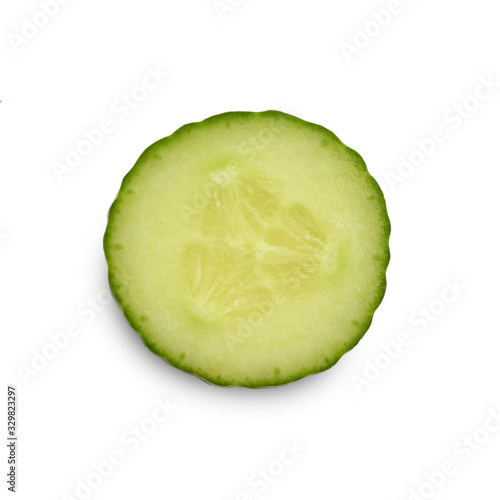 Circle slice of fresh cucumber on white background