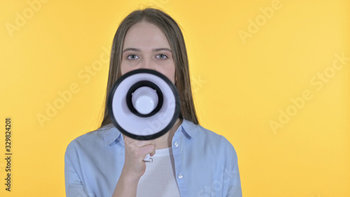 Young Woman Making Announcement on Loudspeaker