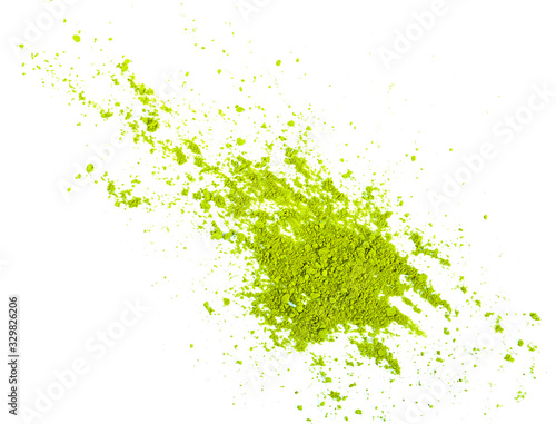 Green tea matcha powder are diffused and diffused. Isolated on a white background. Top view.