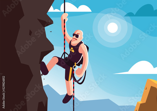 man rock climbing the mountain
