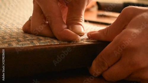 Wallpaper Mural Master restores the antique armchair. Classical technology. Repair of furniture. Tighten the fabric Torontodigital.ca