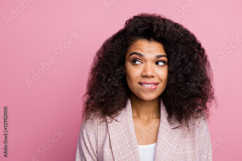 Minded charming stylish trendy afro american broker girl look copyspace want know colleagues secret chief promotion choice bite teeth lips wear plaid jacket isolated pink color background