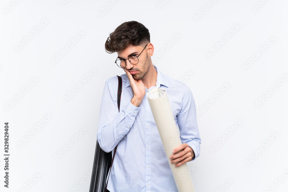 Young architect man over isolated white background unhappy and frustrated Young architect man over isolated white background unhappy and frustrated