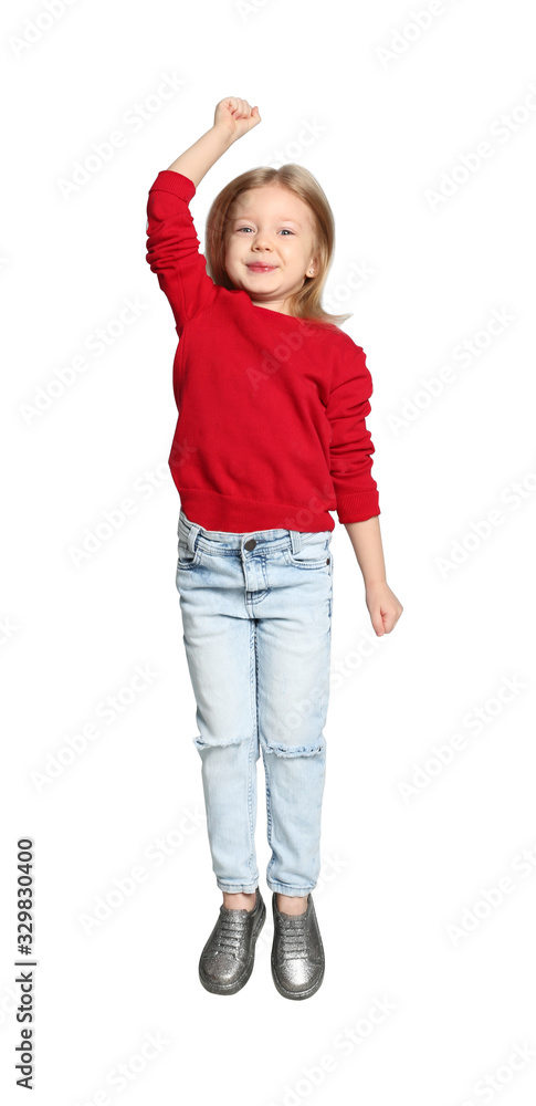 Cute little girl jumping on light grey background Cute little girl jumping on light grey background