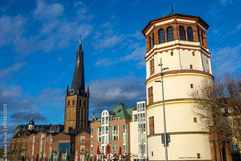 Fototapeta premium Castle Tower and St. Lambertus Church in Dusseldorf, Germany