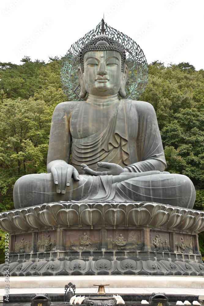 Giant Buddha in Bhumisparsha Mudra Portrait, Seoraksan, Korea Giant Buddha in Bhumisparsha Mudra Portrait, Seoraksan, Korea