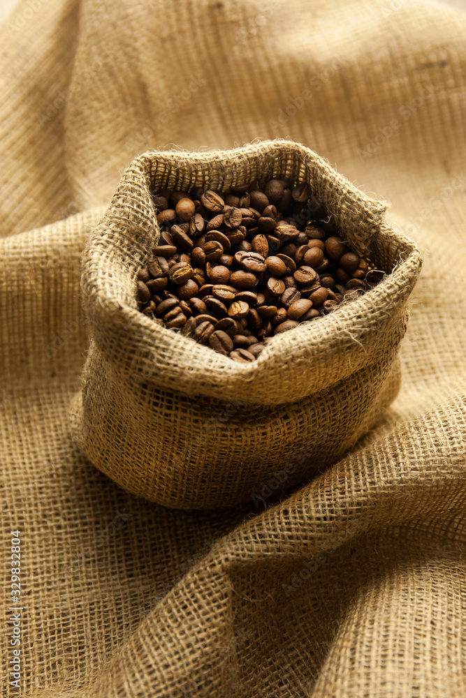 Burlap hessian sack of roasted coffee beans Burlap hessian sack of roasted coffee beans
