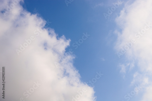 Blue sky background with white clouds 