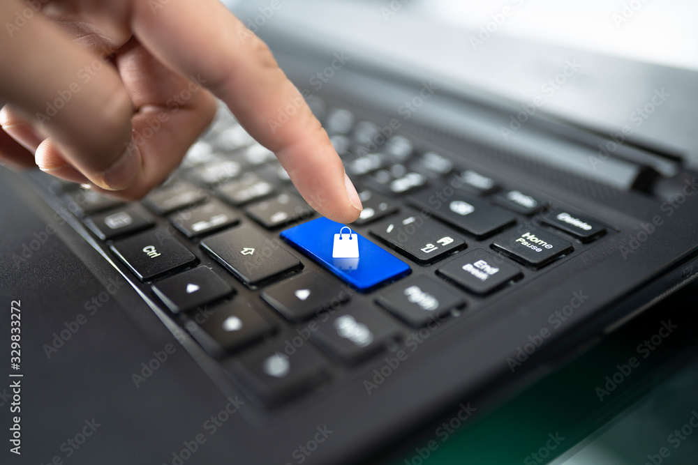 closeup of male hand typing on keyboard closeup of male hand typing on keyboard