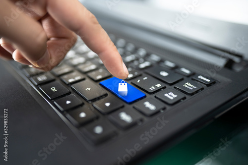 closeup of male hand typing on keyboard