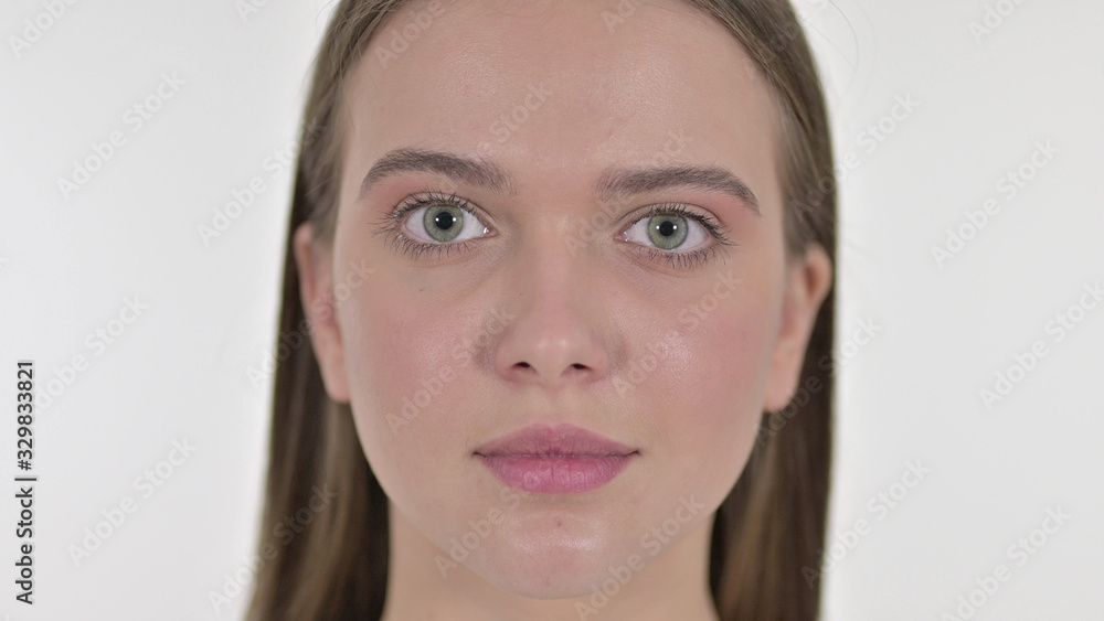 Face of Beautiful Young Woman Looking at Camera Face of Beautiful Young Woman Looking at Camera