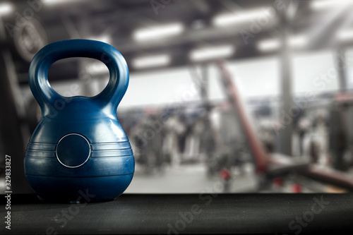 Fototapeta Naklejka Na Ścianę i Meble -  Dark interior of gym and dumbbells.Free space for your decoration and healthy life 