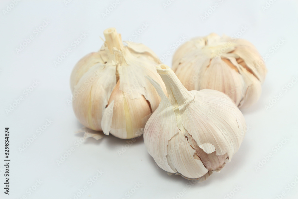 Obraz premium Organic garlic on white background.