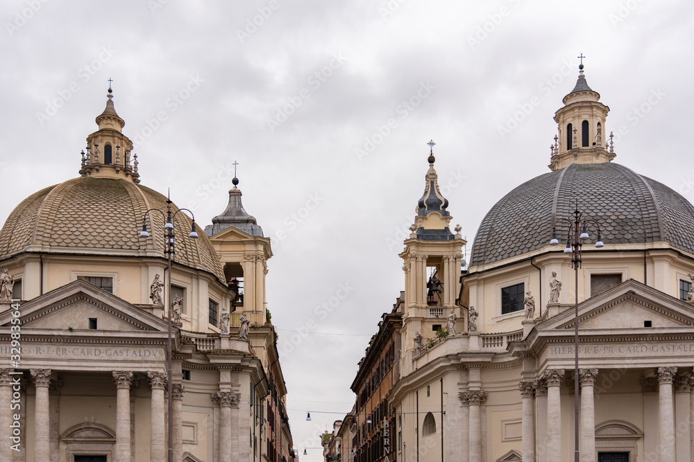 Twin churches in Piazza del Popolo Rome, Italy. Santa Maria in Montesano and Santa Maria dei Miracoli from the second half of the seventeenth century