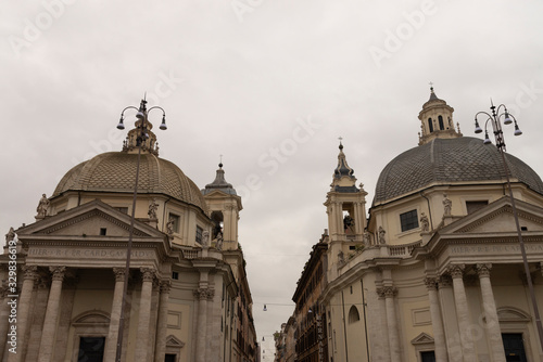 Twin churches in Piazza del Popolo Rome, Italy. Santa Maria in Montesano and Santa Maria dei Miracoli from the second half of the seventeenth century © Roza_Sean