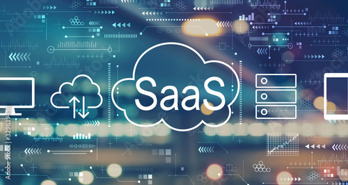 SaaS - software as a service concept with blurred city abstract lights background
