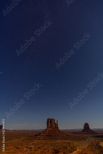 Darkness with stars over monument valley