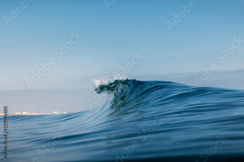 Photography Ocean ideal wave in ocean. Breaking blue wave