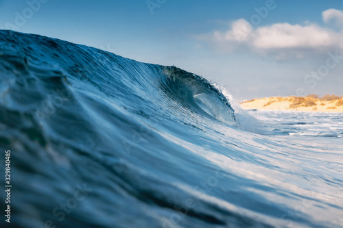 Ocean ideal wave in ocean. Breaking blue wave © artifirsov
