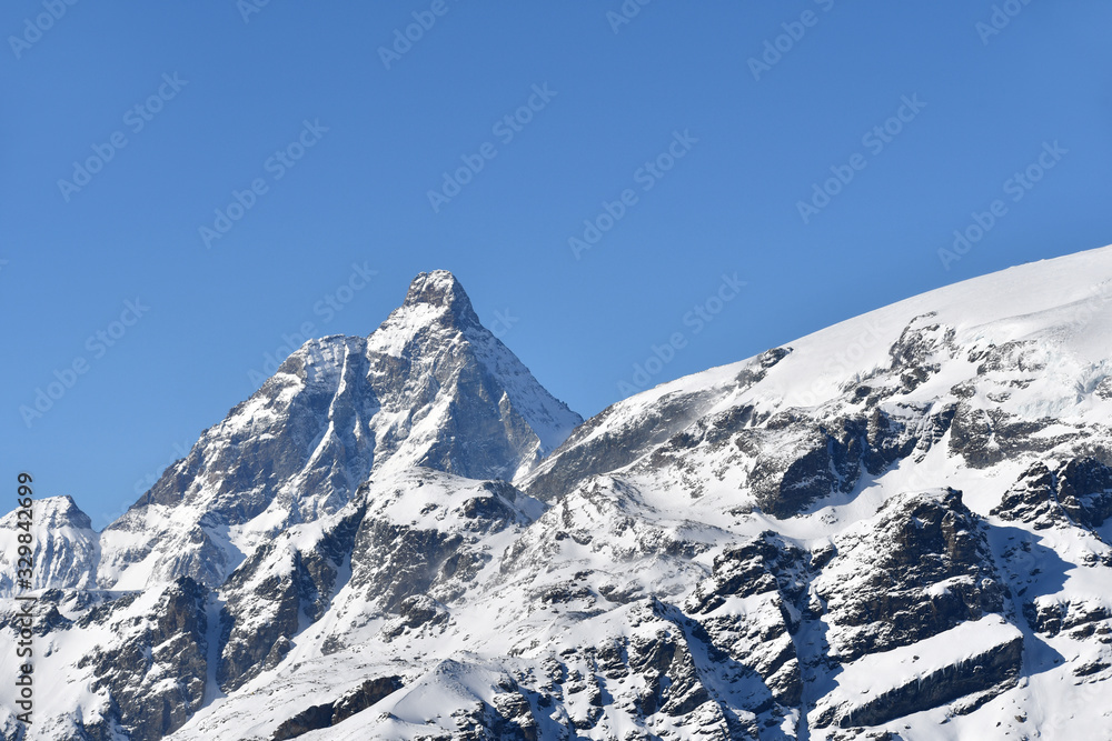 The Matterhorn overlooks the mountain landscape