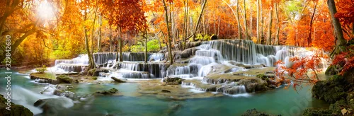 Panel kuchenny z motywem A beautiful waterfall deep in the tropical forest steep mountain adventure in the rainforest.