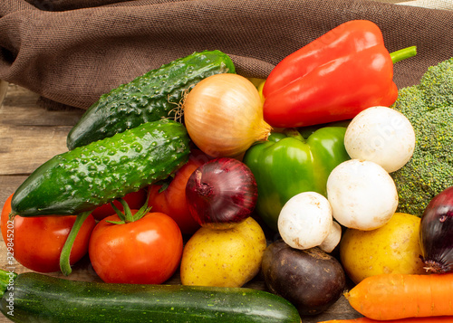 Homemade vegetables on a wooden background view from the side